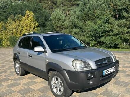 Серый Хендай Туксон, объемом двигателя 1.99 л и пробегом 255 тыс. км за 5800 $, фото 1 на Automoto.ua