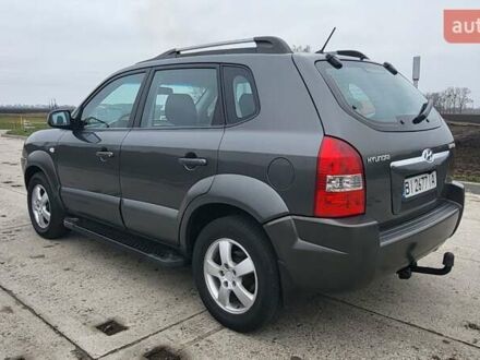 Серый Хендай Туксон, объемом двигателя 1.98 л и пробегом 177 тыс. км за 8200 $, фото 1 на Automoto.ua