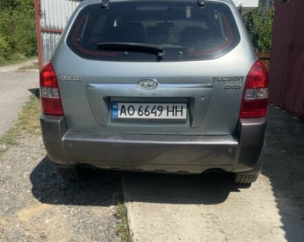 Серый Хендай Туксон, объемом двигателя 2 л и пробегом 250 тыс. км за 5800 $, фото 1 на Automoto.ua