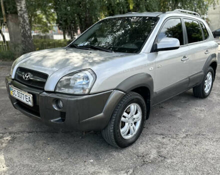 Серый Хендай Туксон, объемом двигателя 1.99 л и пробегом 257 тыс. км за 7900 $, фото 1 на Automoto.ua