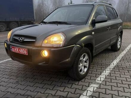 Сірий Хендай Туксон, об'ємом двигуна 1.98 л та пробігом 233 тис. км за 8699 $, фото 1 на Automoto.ua
