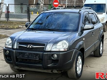 Серый Хендай Туксон, объемом двигателя 2 л и пробегом 85 тыс. км за 9300 $, фото 1 на Automoto.ua