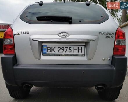 Сірий Хендай Туксон, об'ємом двигуна 1.99 л та пробігом 183 тис. км за 9100 $, фото 1 на Automoto.ua