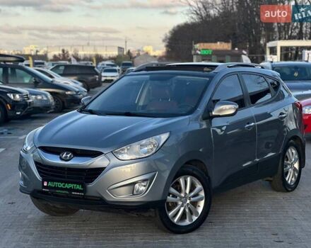 Сірий Хендай Туксон, об'ємом двигуна 2.36 л та пробігом 150 тис. км за 12990 $, фото 1 на Automoto.ua