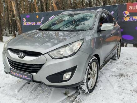 Серый Хендай Туксон, объемом двигателя 2 л и пробегом 174 тыс. км за 11900 $, фото 1 на Automoto.ua