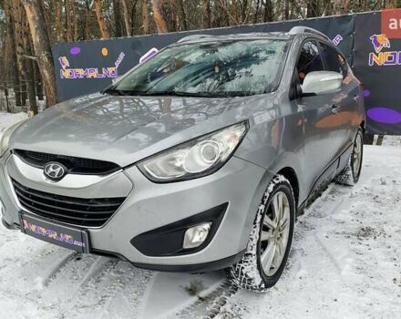 Серый Хендай Туксон, объемом двигателя 2 л и пробегом 174 тыс. км за 11900 $, фото 1 на Automoto.ua