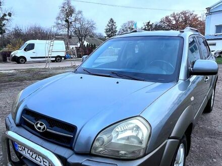 Серый Хендай Туксон, объемом двигателя 2 л и пробегом 165 тыс. км за 10000 $, фото 1 на Automoto.ua