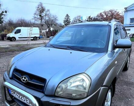 Серый Хендай Туксон, объемом двигателя 2 л и пробегом 165 тыс. км за 10000 $, фото 1 на Automoto.ua