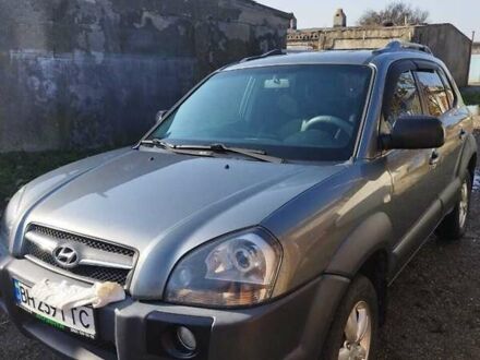 Серый Хендай Туксон, объемом двигателя 2 л и пробегом 168 тыс. км за 9499 $, фото 1 на Automoto.ua