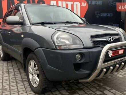 Серый Хендай Туксон, объемом двигателя 1.98 л и пробегом 174 тыс. км за 9500 $, фото 1 на Automoto.ua