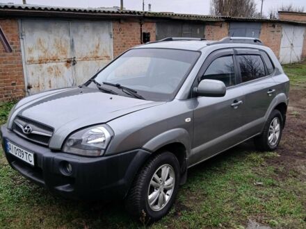 Серый Хендай Туксон, объемом двигателя 2 л и пробегом 78 тыс. км за 11600 $, фото 1 на Automoto.ua