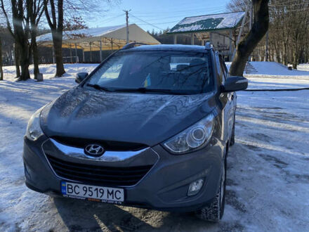 Сірий Хендай Туксон, об'ємом двигуна 2 л та пробігом 186 тис. км за 12500 $, фото 1 на Automoto.ua