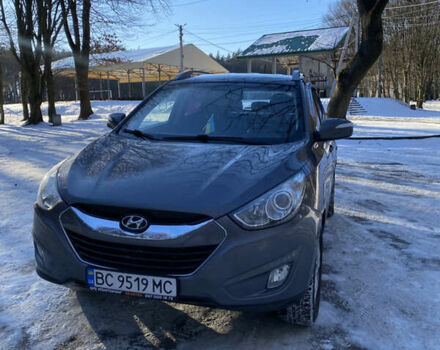 Серый Хендай Туксон, объемом двигателя 2 л и пробегом 186 тыс. км за 12500 $, фото 1 на Automoto.ua