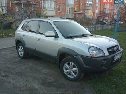 Серый Хендай Туксон, объемом двигателя 2 л и пробегом 82 тыс. км за 11500 $, фото 1 на Automoto.ua
