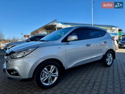 Серый Хендай Туксон, объемом двигателя 2 л и пробегом 187 тыс. км за 12900 $, фото 1 на Automoto.ua