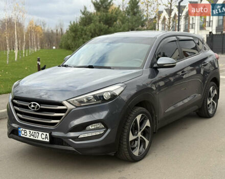 Серый Хендай Туксон, объемом двигателя 2 л и пробегом 195 тыс. км за 15000 $, фото 1 на Automoto.ua