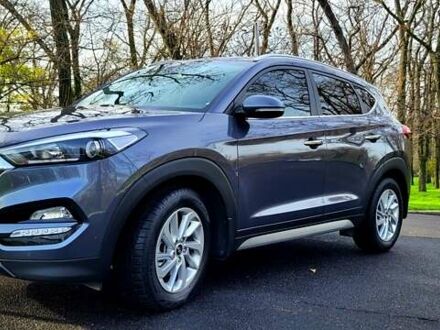 Серый Хендай Туксон, объемом двигателя 2 л и пробегом 19 тыс. км за 25000 $, фото 1 на Automoto.ua