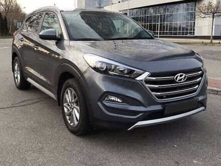 Серый Хендай Туксон, объемом двигателя 2 л и пробегом 130 тыс. км за 14400 $, фото 1 на Automoto.ua