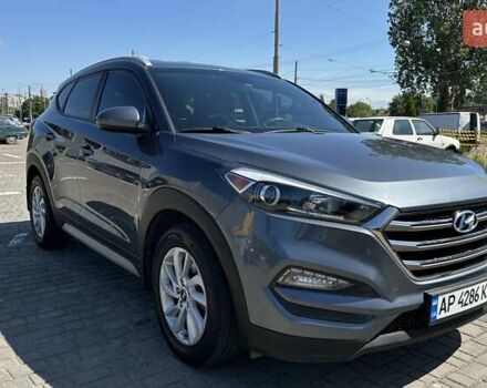 Серый Хендай Туксон, объемом двигателя 2 л и пробегом 103 тыс. км за 16900 $, фото 1 на Automoto.ua