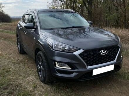 Серый Хендай Туксон, объемом двигателя 2 л и пробегом 99 тыс. км за 9600 $, фото 1 на Automoto.ua