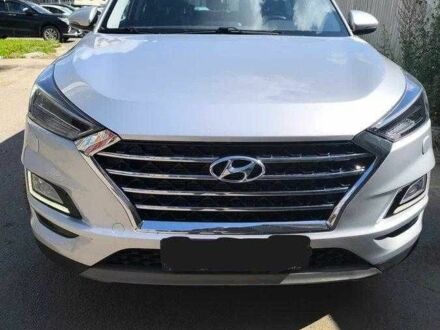 Серый Хендай Туксон, объемом двигателя 2.4 л и пробегом 71 тыс. км за 14000 $, фото 1 на Automoto.ua