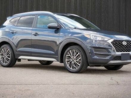 Серый Хендай Туксон, объемом двигателя 2.4 л и пробегом 33 тыс. км за 14000 $, фото 1 на Automoto.ua