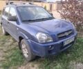 Синий Хендай Туксон, объемом двигателя 2 л и пробегом 359 тыс. км за 7000 $, фото 1 на Automoto.ua