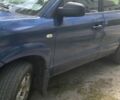Синий Хендай Туксон, объемом двигателя 2 л и пробегом 359 тыс. км за 7000 $, фото 1 на Automoto.ua