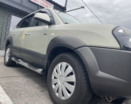 Синий Хендай Туксон, объемом двигателя 2 л и пробегом 271 тыс. км за 4200 $, фото 5 на Automoto.ua