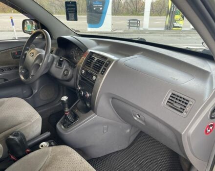 Синий Хендай Туксон, объемом двигателя 2 л и пробегом 271 тыс. км за 4200 $, фото 23 на Automoto.ua