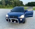 Синий Хендай Туксон, объемом двигателя 2 л и пробегом 200 тыс. км за 7699 $, фото 1 на Automoto.ua