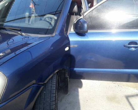 Синий Хендай Туксон, объемом двигателя 2 л и пробегом 223 тыс. км за 7700 $, фото 11 на Automoto.ua