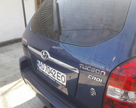Синий Хендай Туксон, объемом двигателя 2 л и пробегом 223 тыс. км за 7700 $, фото 4 на Automoto.ua