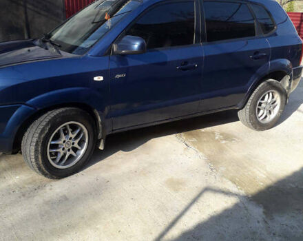 Синий Хендай Туксон, объемом двигателя 2 л и пробегом 223 тыс. км за 7700 $, фото 1 на Automoto.ua