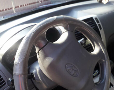 Синий Хендай Туксон, объемом двигателя 2 л и пробегом 223 тыс. км за 7700 $, фото 7 на Automoto.ua