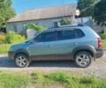 Синий Хендай Туксон, объемом двигателя 2 л и пробегом 266 тыс. км за 7000 $, фото 1 на Automoto.ua