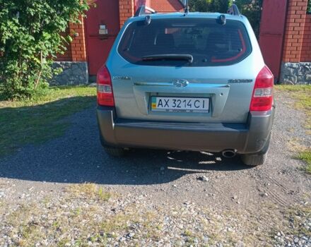 Синий Хендай Туксон, объемом двигателя 2 л и пробегом 266 тыс. км за 7000 $, фото 2 на Automoto.ua