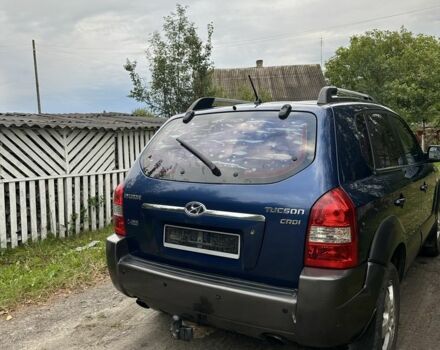 Синий Хендай Туксон, объемом двигателя 2 л и пробегом 301 тыс. км за 3742 $, фото 3 на Automoto.ua