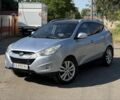 Синий Хендай Туксон, объемом двигателя 2.4 л и пробегом 231 тыс. км за 9902 $, фото 1 на Automoto.ua