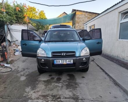 Синий Хендай Туксон, объемом двигателя 2 л и пробегом 380 тыс. км за 6000 $, фото 8 на Automoto.ua