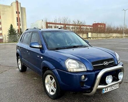 Синий Хендай Туксон, объемом двигателя 2 л и пробегом 224 тыс. км за 8300 $, фото 1 на Automoto.ua