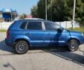 Синий Хендай Туксон, объемом двигателя 2 л и пробегом 310 тыс. км за 6500 $, фото 7 на Automoto.ua
