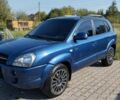 Синий Хендай Туксон, объемом двигателя 2 л и пробегом 310 тыс. км за 6500 $, фото 1 на Automoto.ua