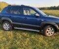 Синий Хендай Туксон, объемом двигателя 2 л и пробегом 215 тыс. км за 6600 $, фото 1 на Automoto.ua