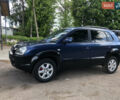 Синий Хендай Туксон, объемом двигателя 1.99 л и пробегом 315 тыс. км за 6700 $, фото 3 на Automoto.ua