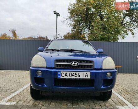Синий Хендай Туксон, объемом двигателя 1.99 л и пробегом 225 тыс. км за 8000 $, фото 2 на Automoto.ua