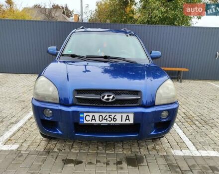 Синий Хендай Туксон, объемом двигателя 1.99 л и пробегом 225 тыс. км за 8000 $, фото 1 на Automoto.ua