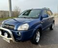 Синий Хендай Туксон, объемом двигателя 2 л и пробегом 224 тыс. км за 8300 $, фото 1 на Automoto.ua