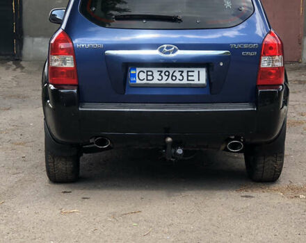 Синий Хендай Туксон, объемом двигателя 1.99 л и пробегом 315 тыс. км за 6700 $, фото 5 на Automoto.ua