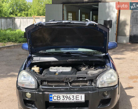 Синий Хендай Туксон, объемом двигателя 1.99 л и пробегом 315 тыс. км за 6700 $, фото 23 на Automoto.ua